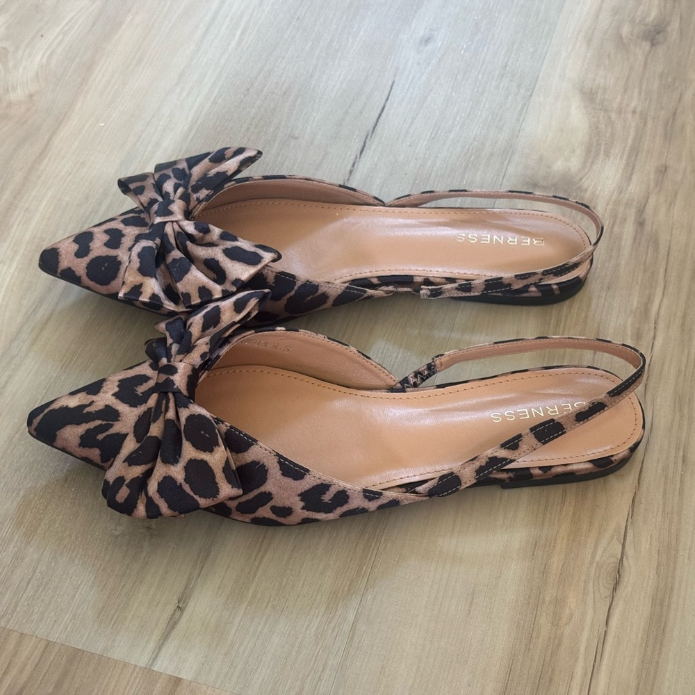 Express Brown and Black Flats with Bow Detail